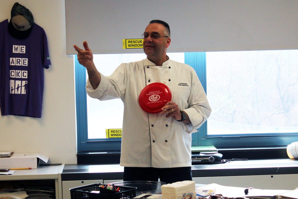 CHef talking to students