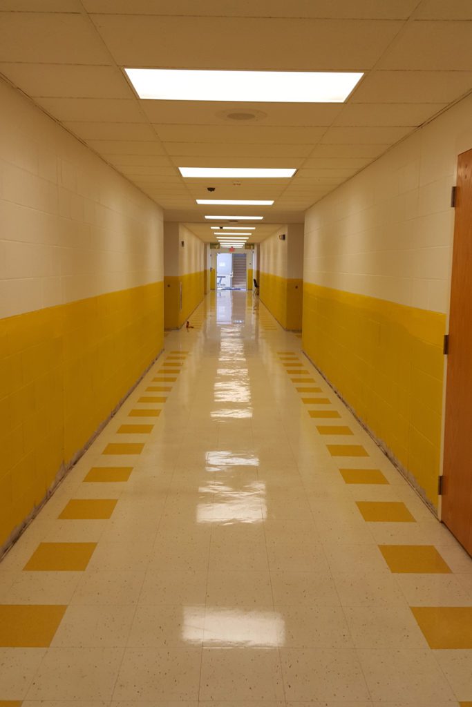 freshly painted yellow hallway