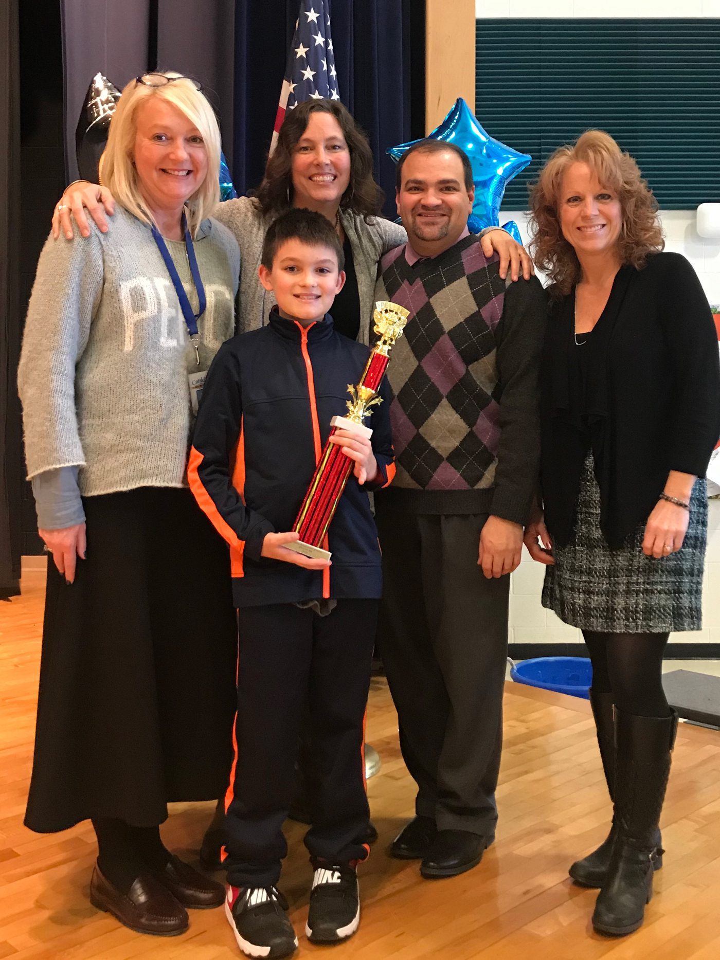 CES Spelling Bee Champion Billy McMullen is joined by (left to right) Mrs. Lisa Schlenker, Catskill Elementary School Assistant Principal, and Catskill Elementary School teachers and Spelling Bee Committee members Mrs. Alexandra Standish, Mr. Matthew Luvera, Mrs. Heather Schindler.