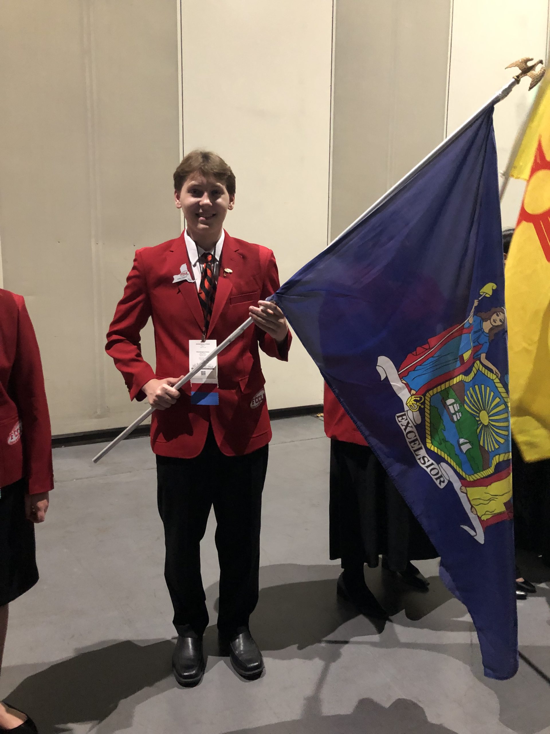 boy holding NYS flag