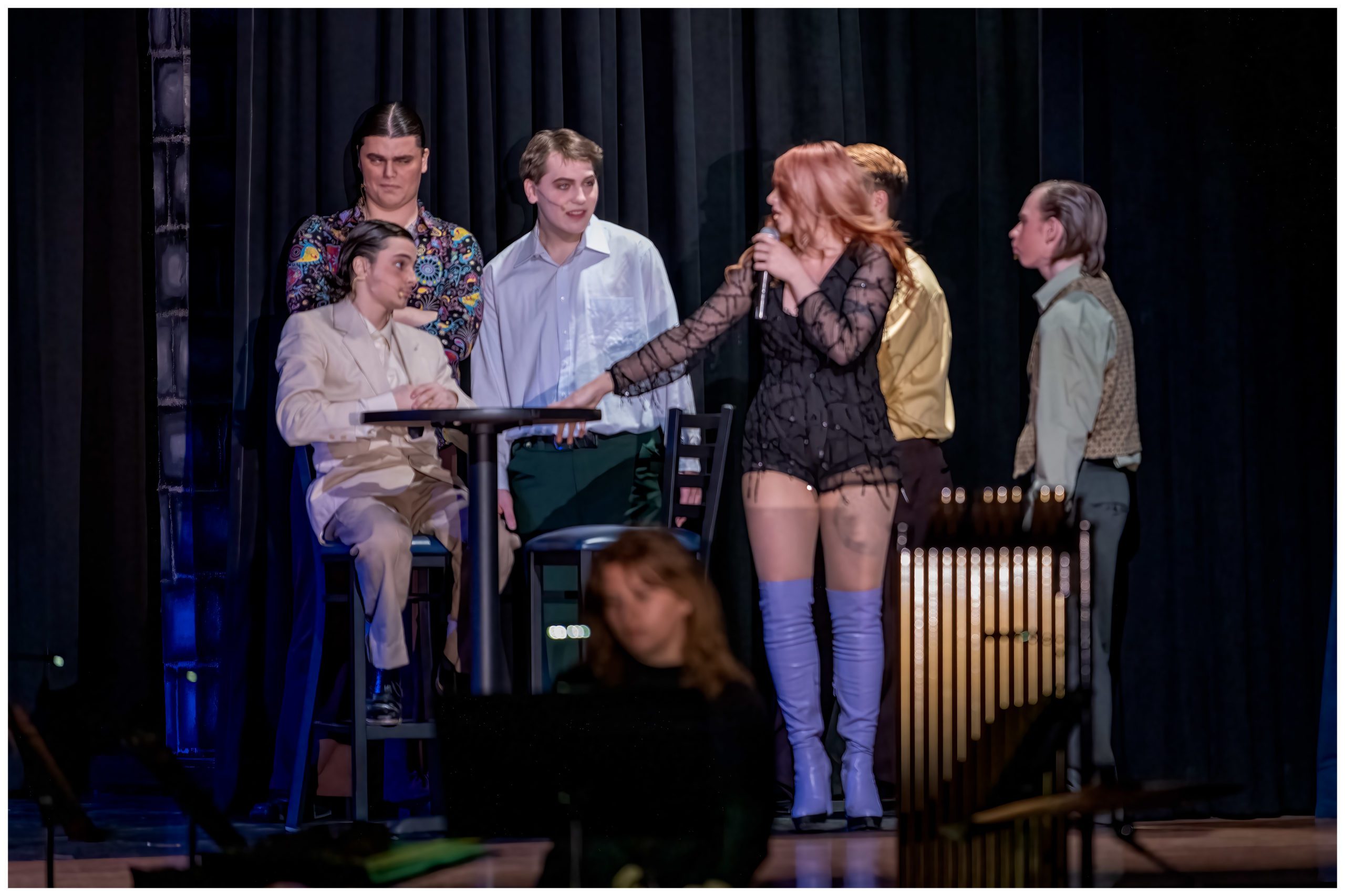 Scene from Sister Act with Disco Diva singing at night club