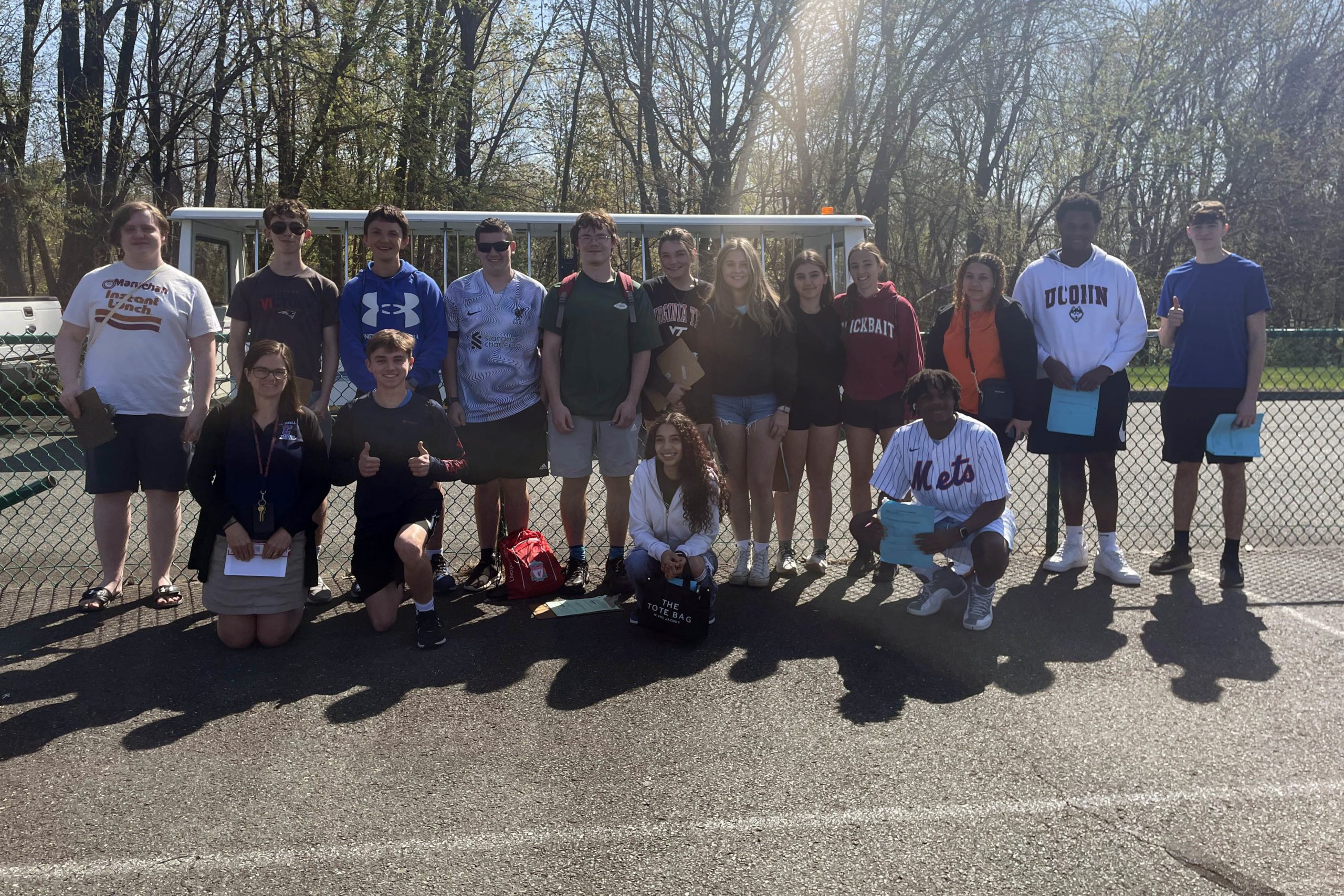 group photo of student in parking lot