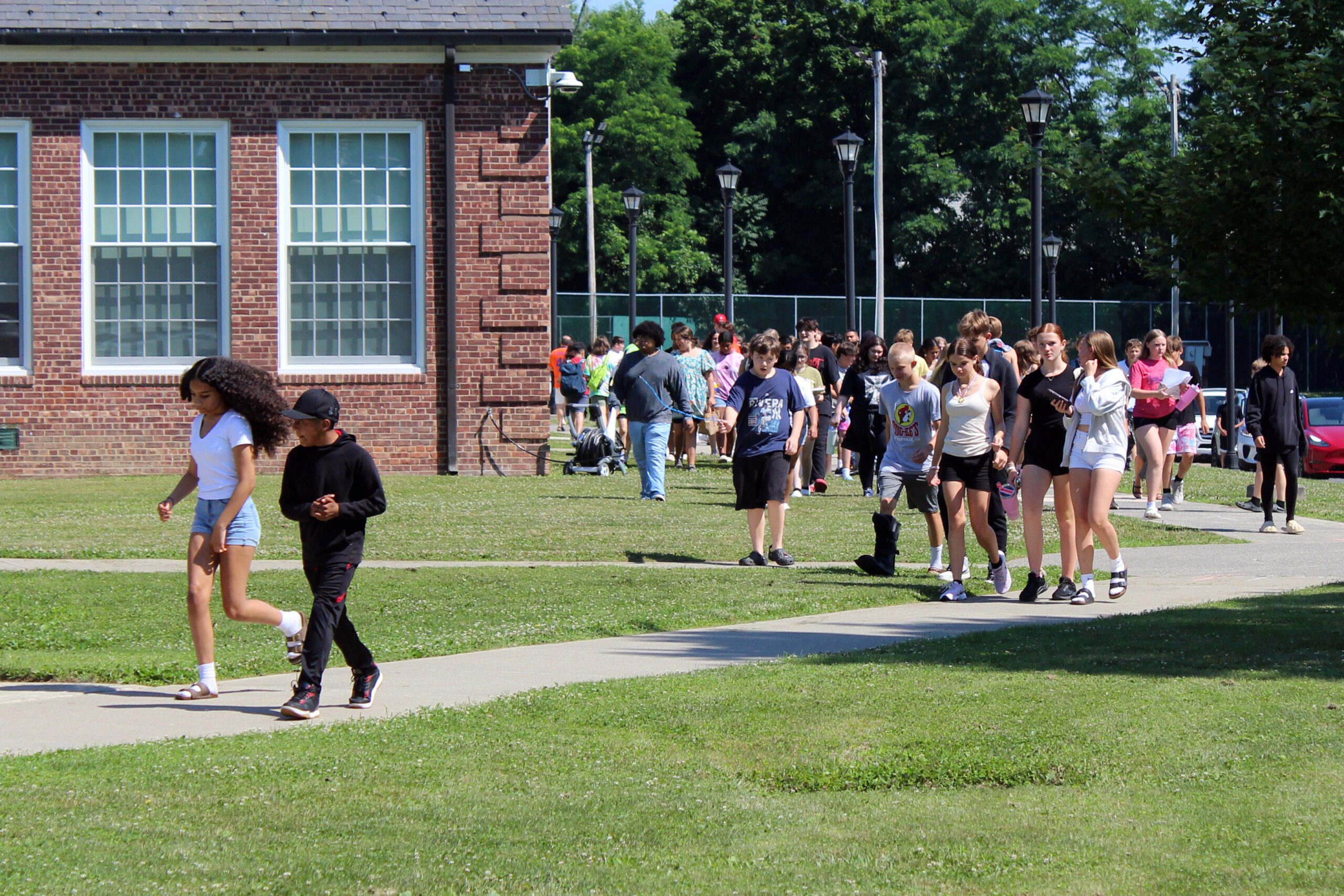 students exiting middle school