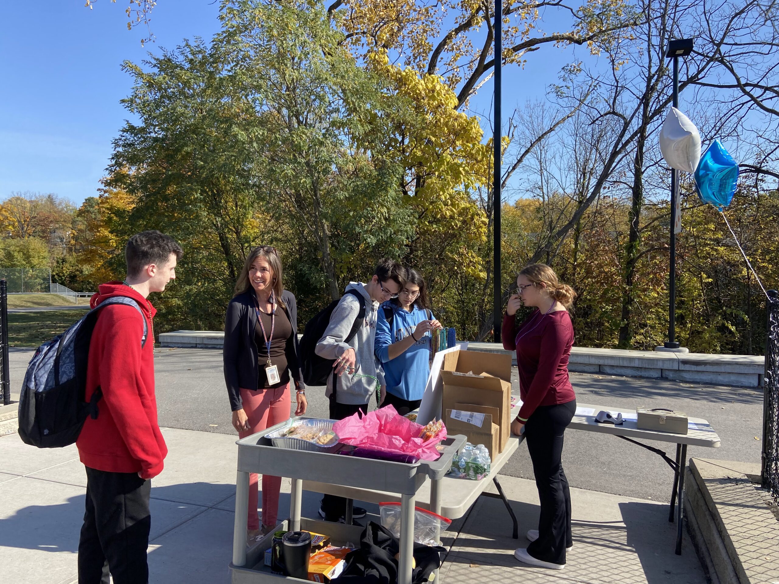students check out information booth