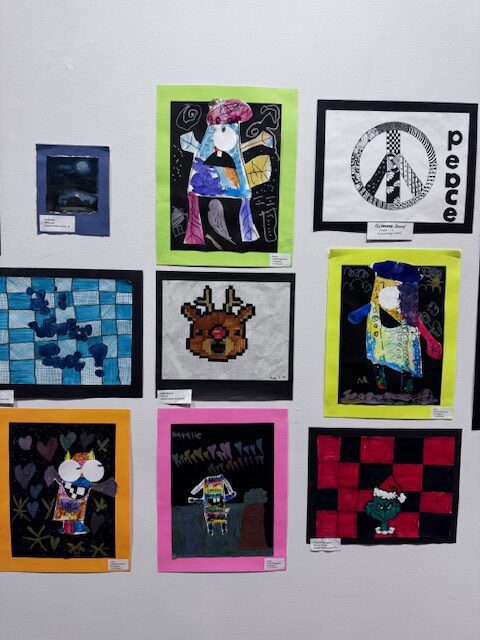 student artwork on gallery wall