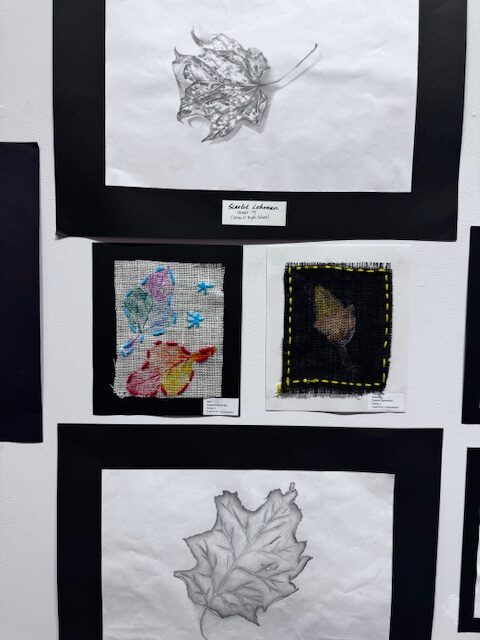 student artwork on gallery wall