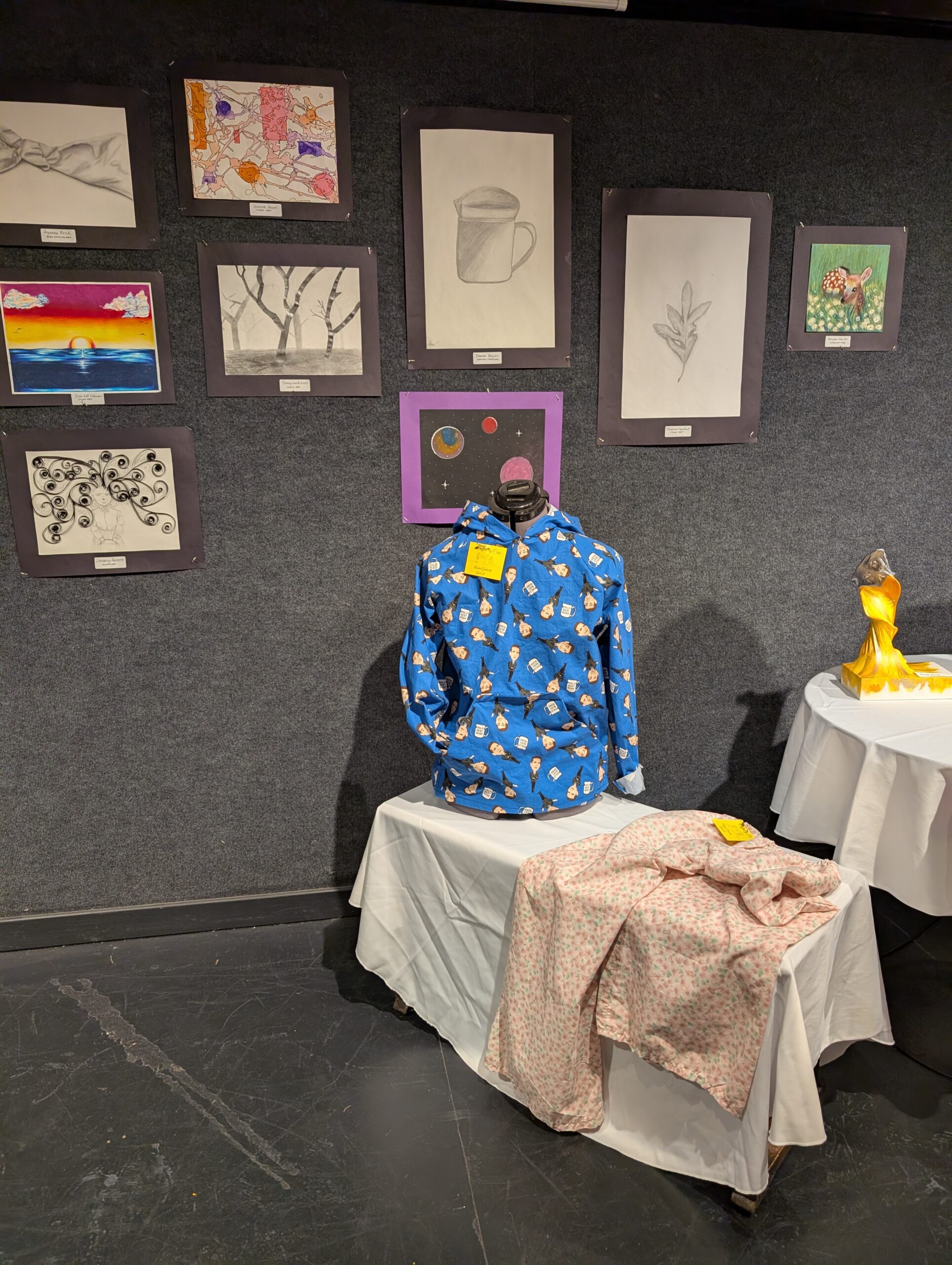 clothes and artwork on display