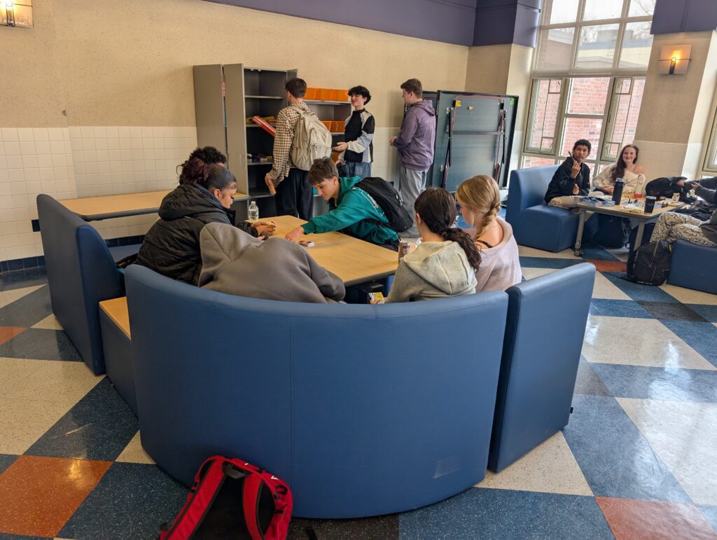 students sitting in lounge area