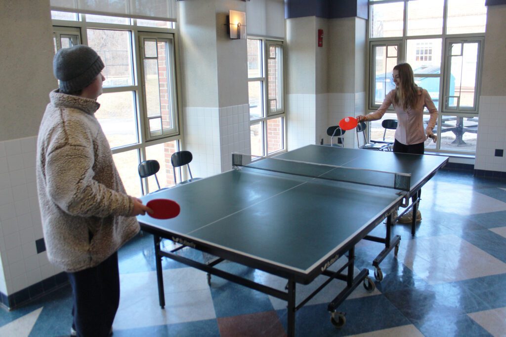 students playing table tennis