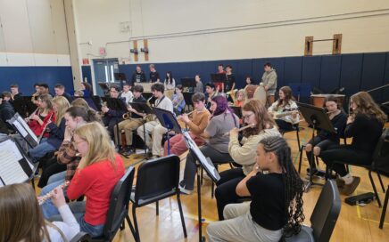 CES and CHS band students playing music together