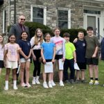 CES Student Council poses with newly planted tree and superintendent Dan Wilson