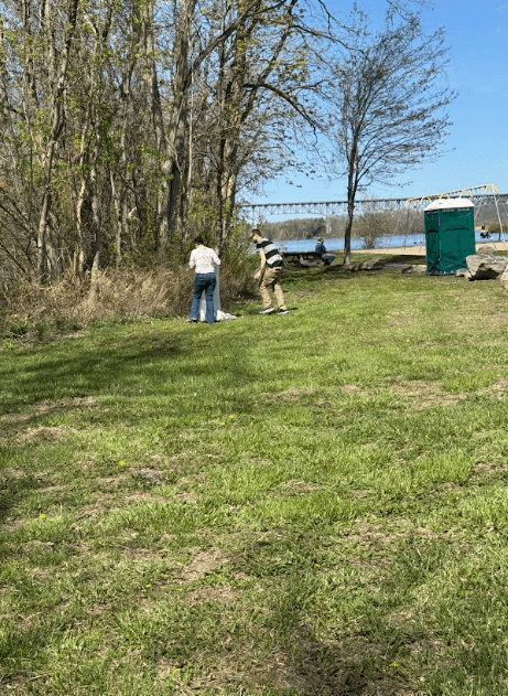 students picking up trash at Dutchman's Landing