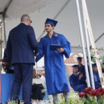 graduate shaking hands with superintendent