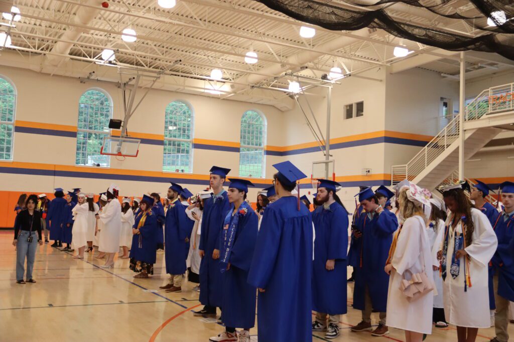 graduates in gym