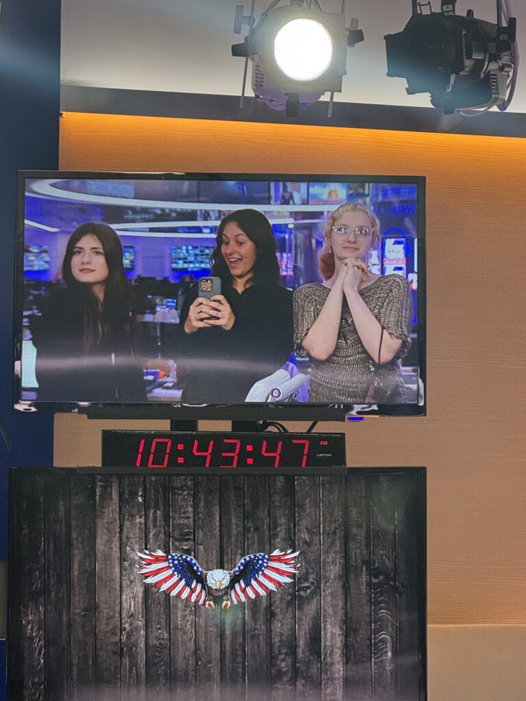 three girls on studio tv screen
