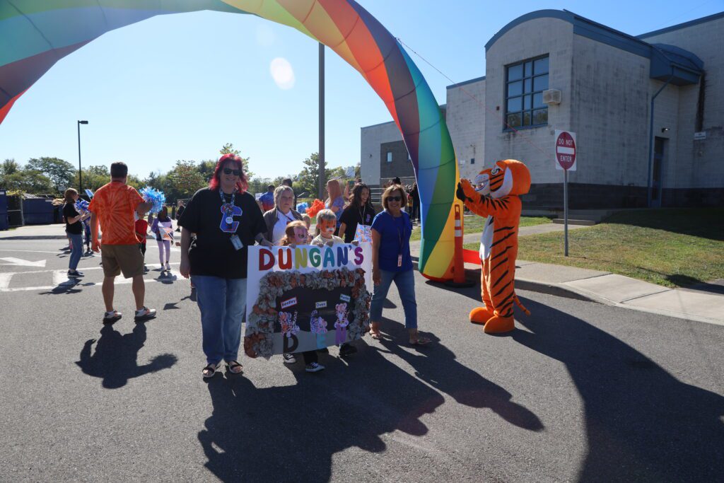students holding banner