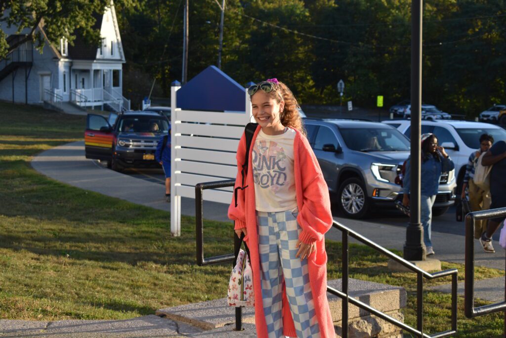 girl dressed in seventies style clothing
