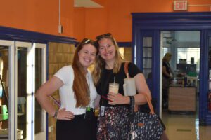 two teachers smiling