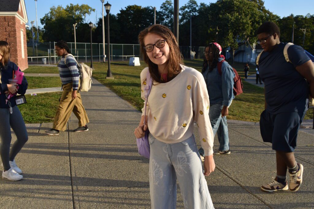 girl dressed in seventies style clothing
