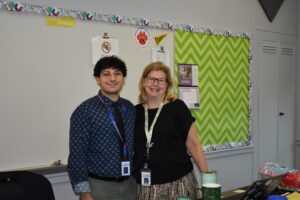 two teachers smiling