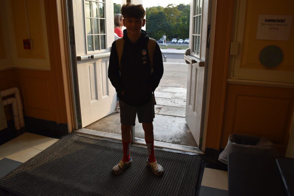 boy wearing crazy socks