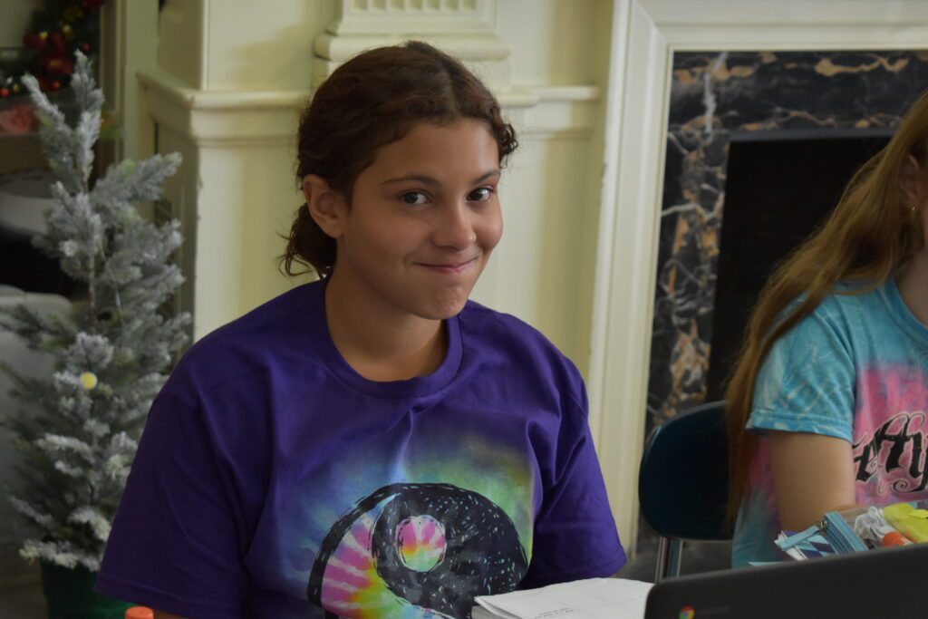 girl dressed in seventies style clothing