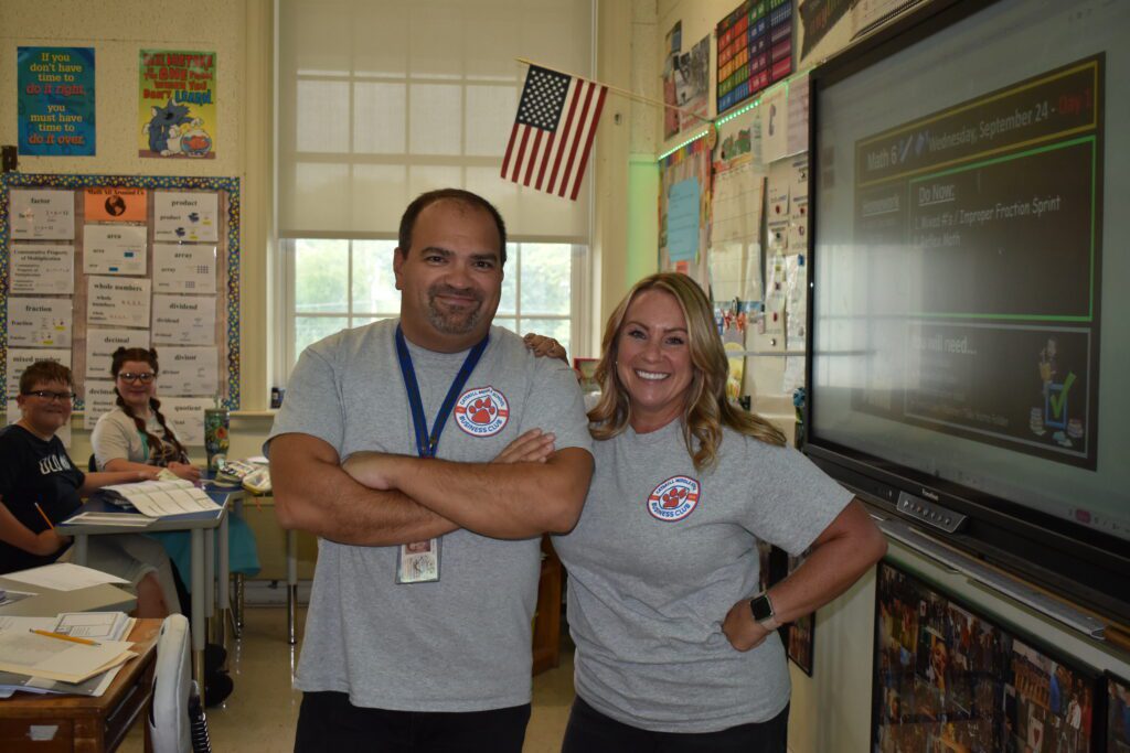 man and women wearing the same shirt