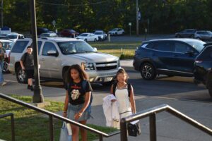 girl walking up to school