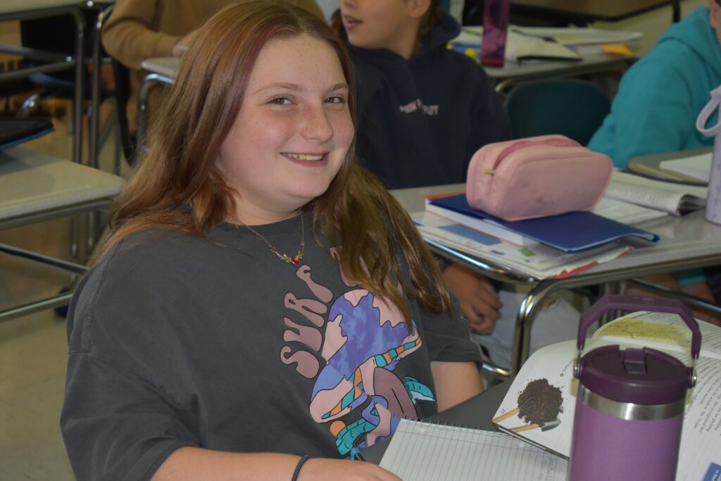 Girl dressed in seventies style clothing