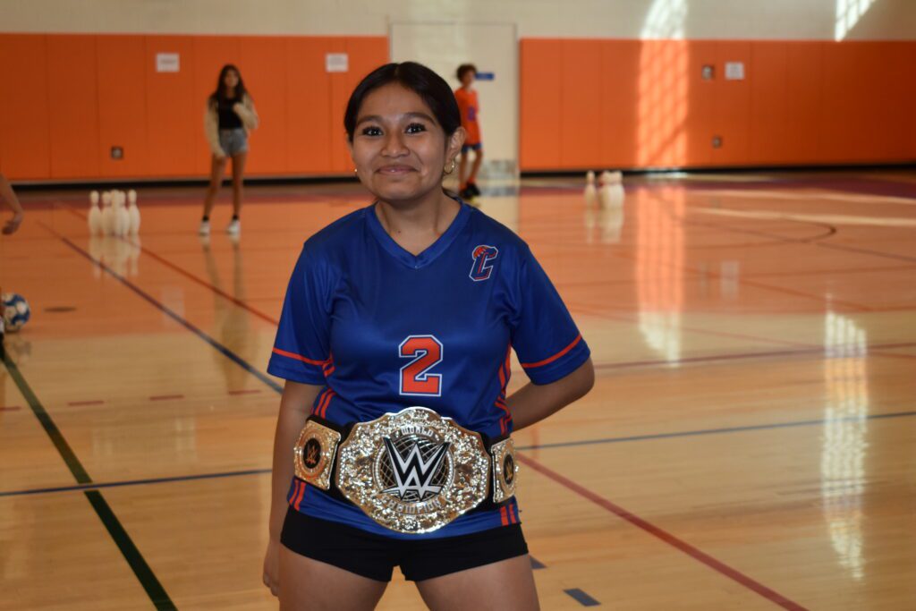 student wearing Catskill shirts