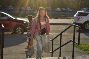 girl walking up to school