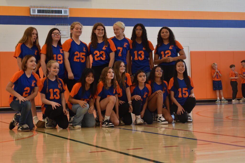 sports team poses for photo