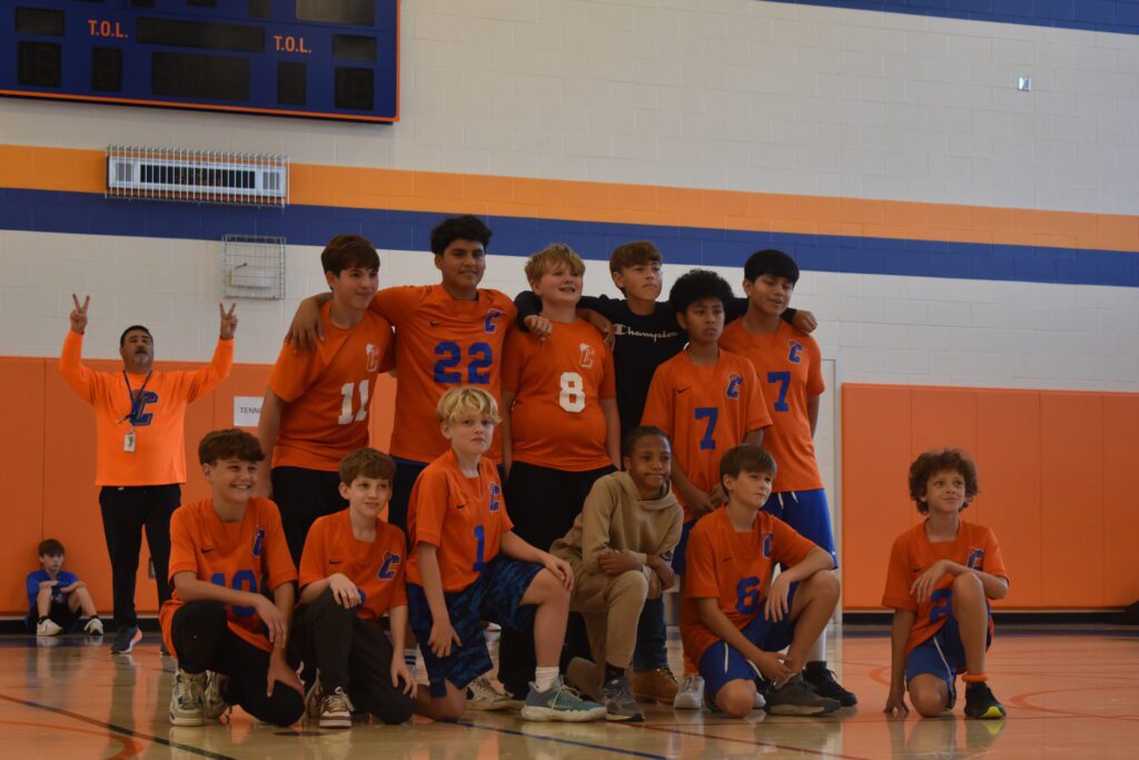 sports team poses for photo