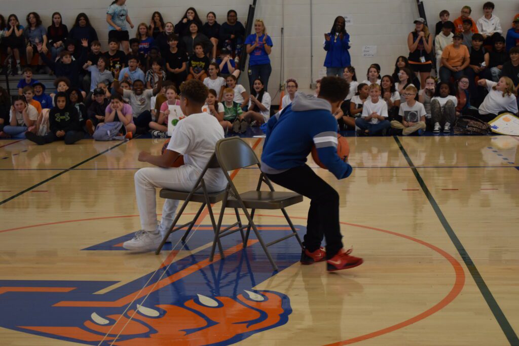 students playing musical chairs