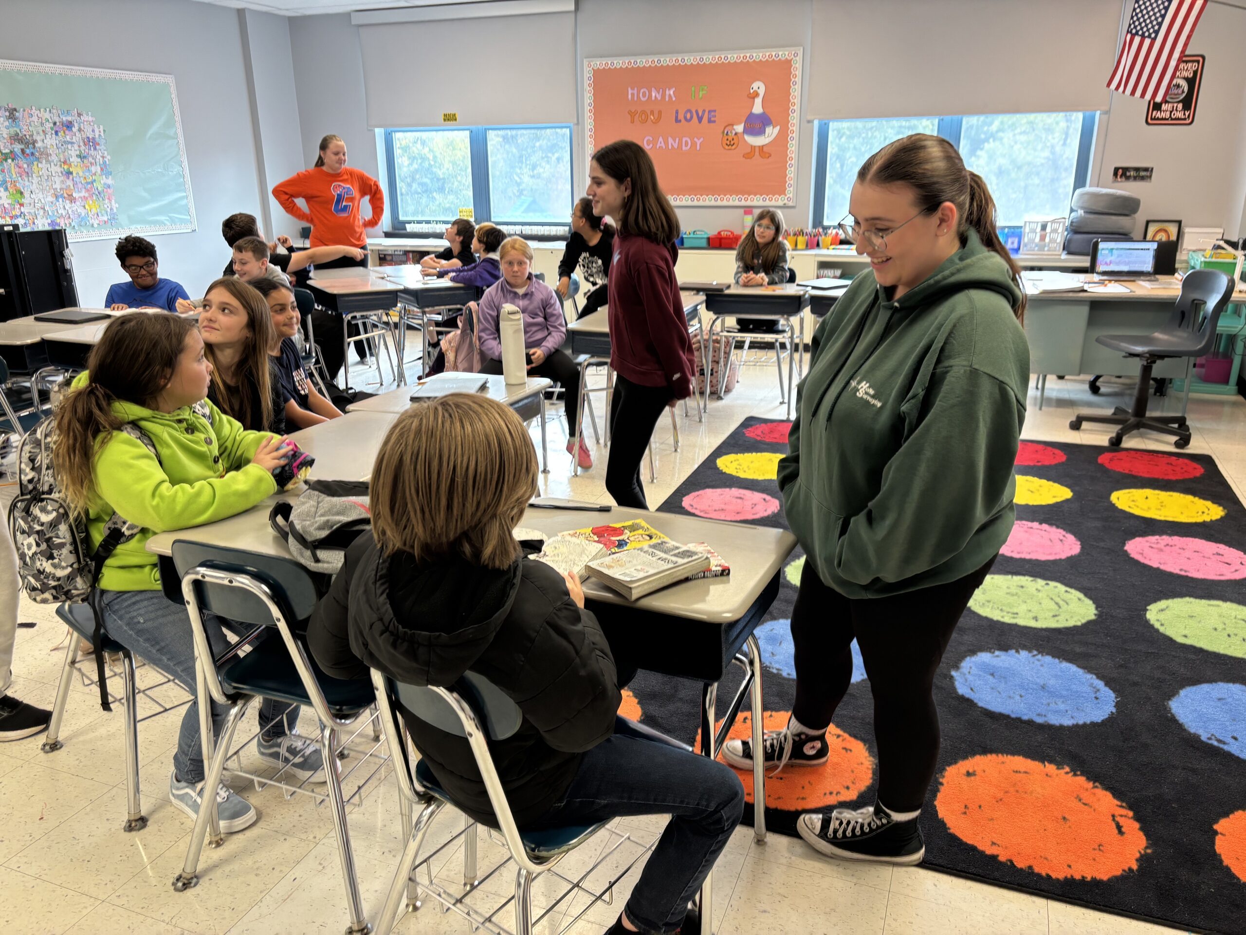 high school students in elementary school classroom
