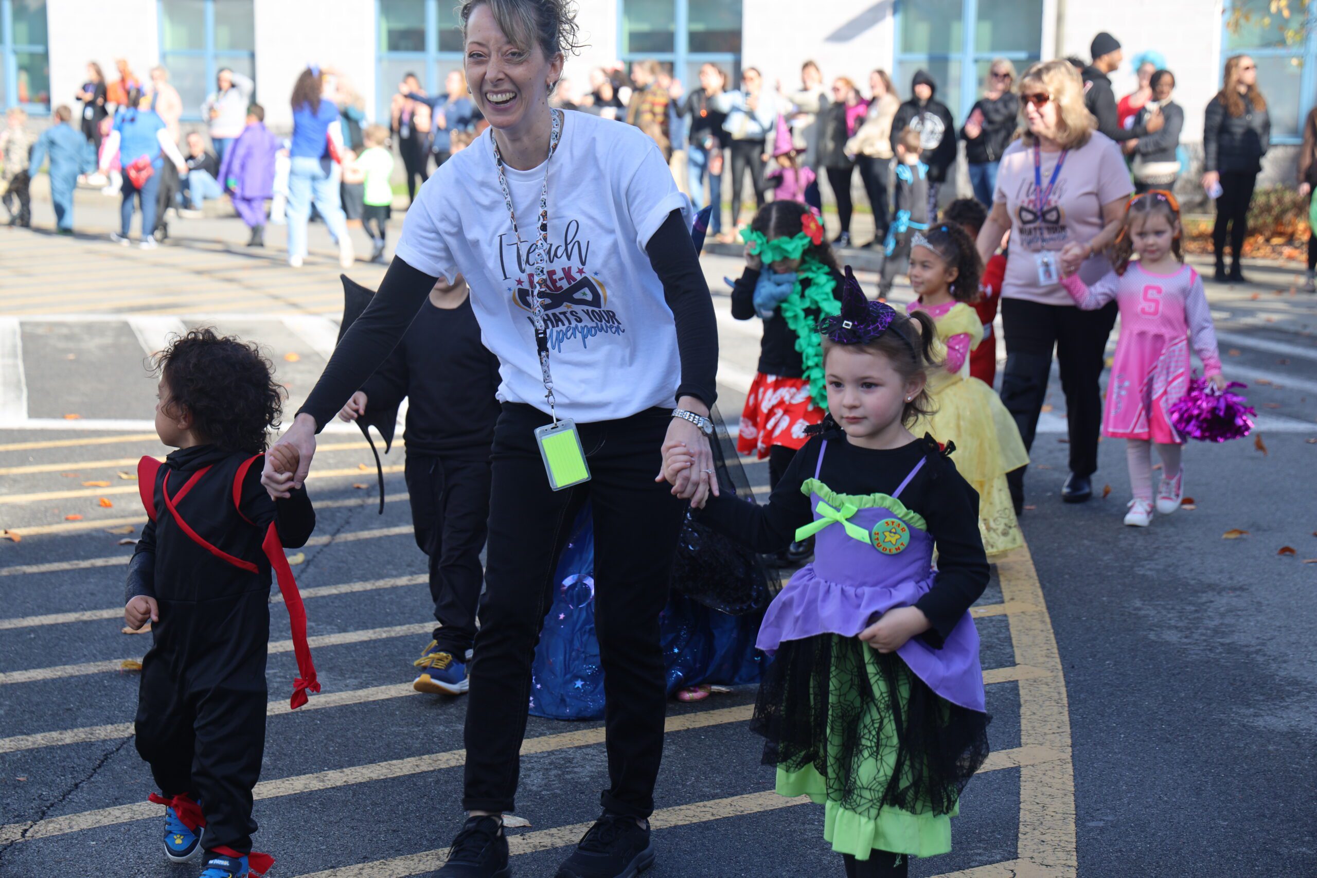students parade in costumes