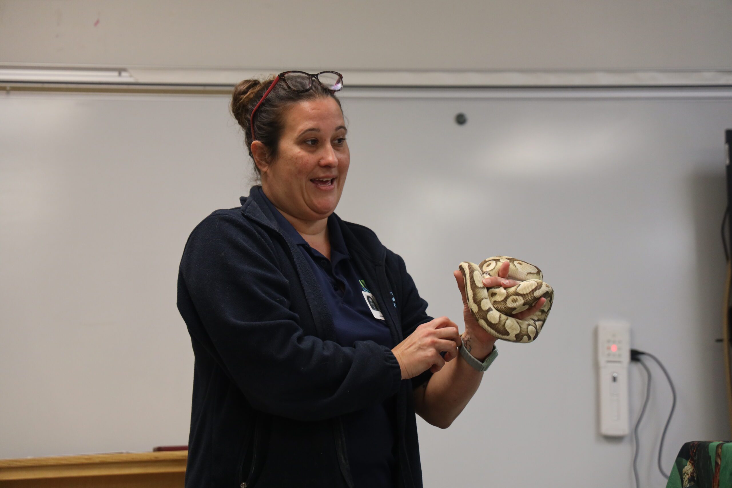 woman holding snake