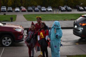 students arriving at school in costumes