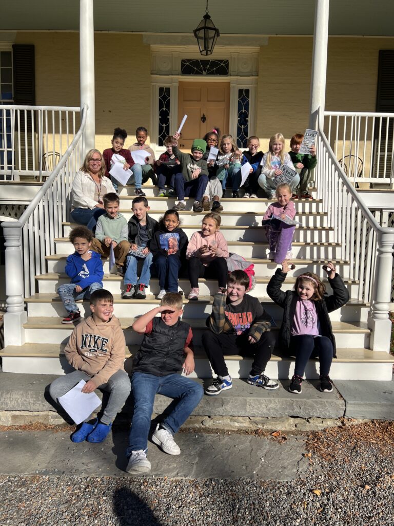 group photo of students on museum steps