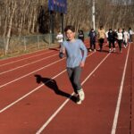 students running on track