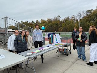 students standing at table