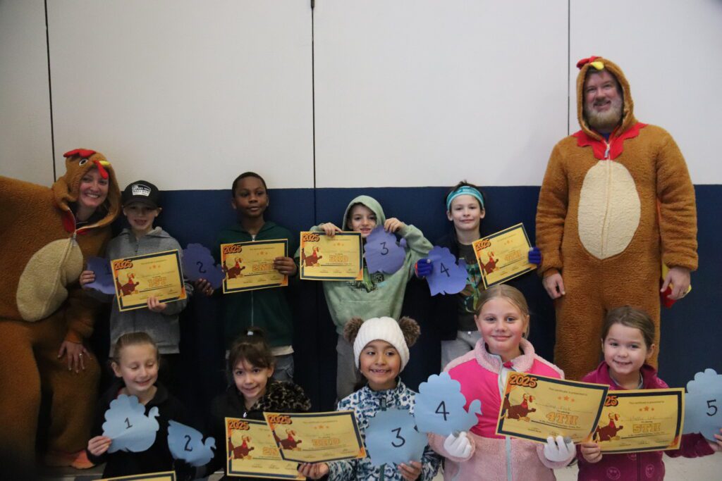 students holding certificates