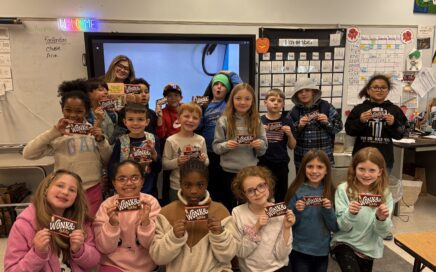 Students pose for class photo with Wonka Bars