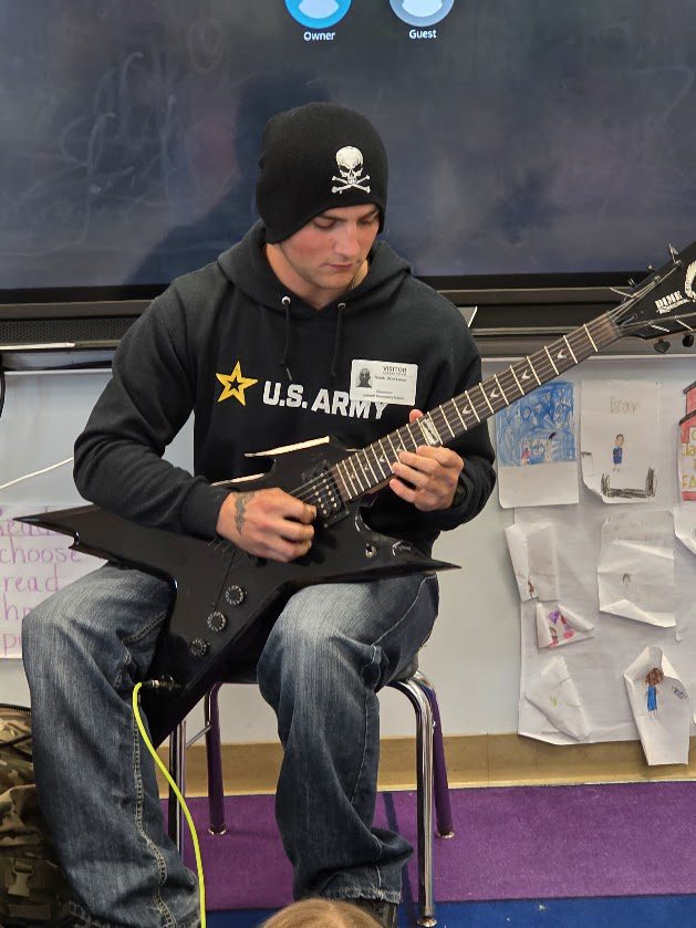 young man playing guitar
