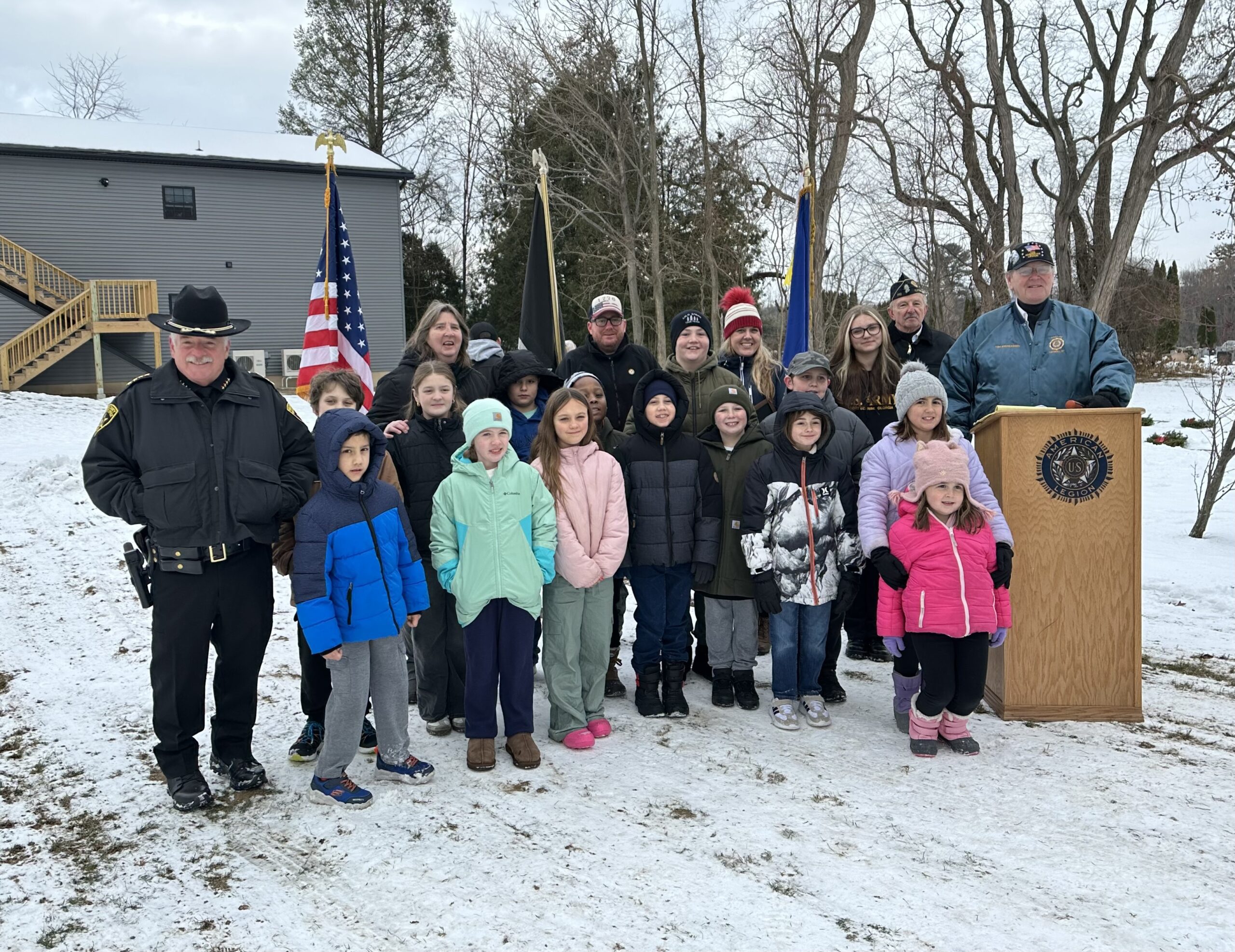 group photo of student in cemetery