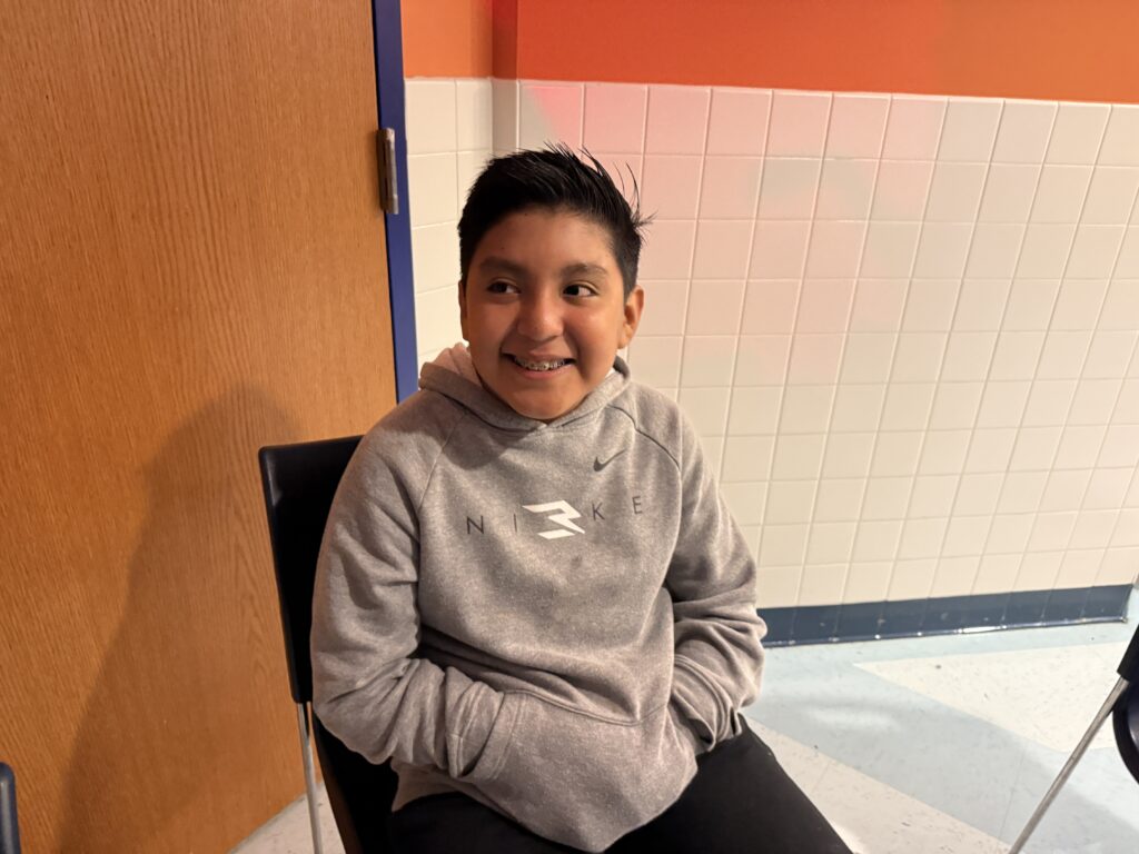 boy sitting in chair