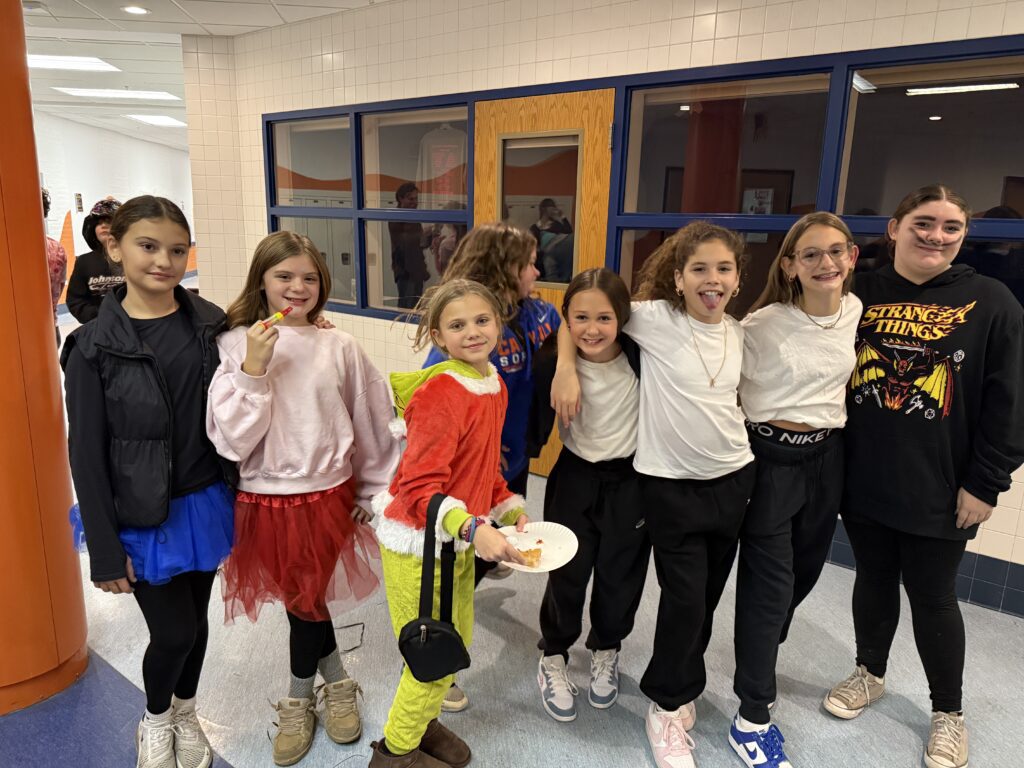 group of girls posing for photo