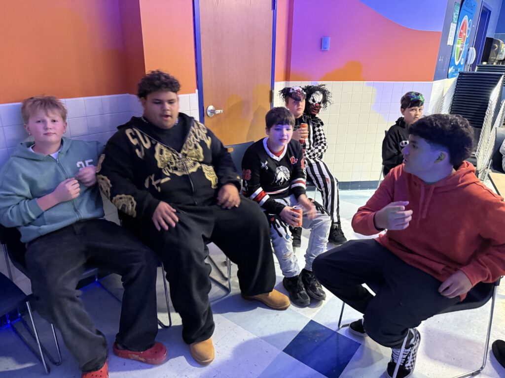 boys sitting at table