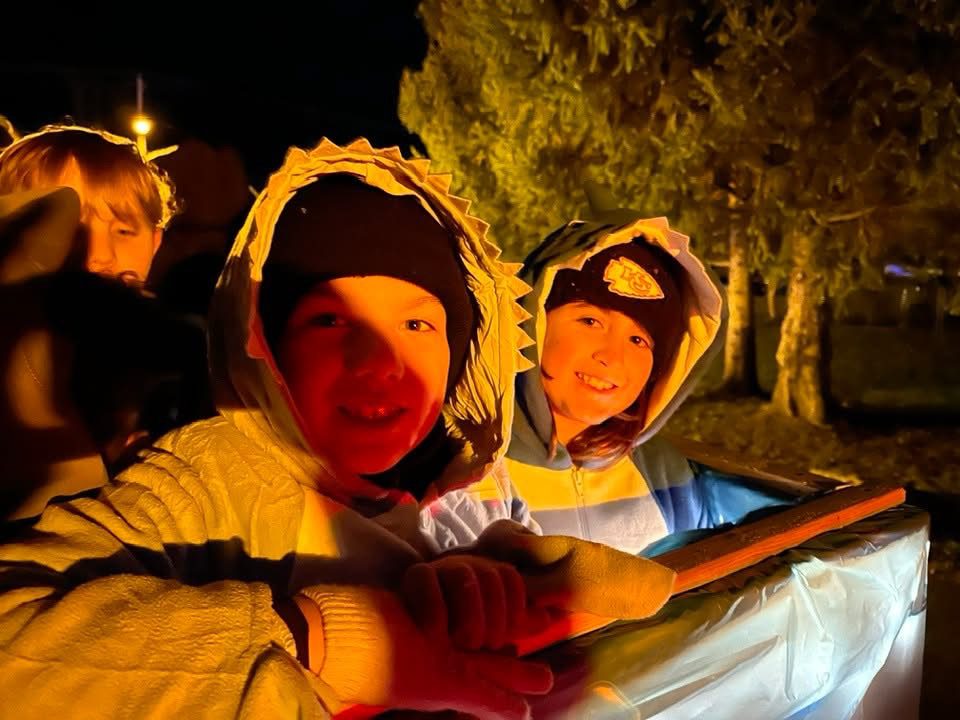 boys smiling on float