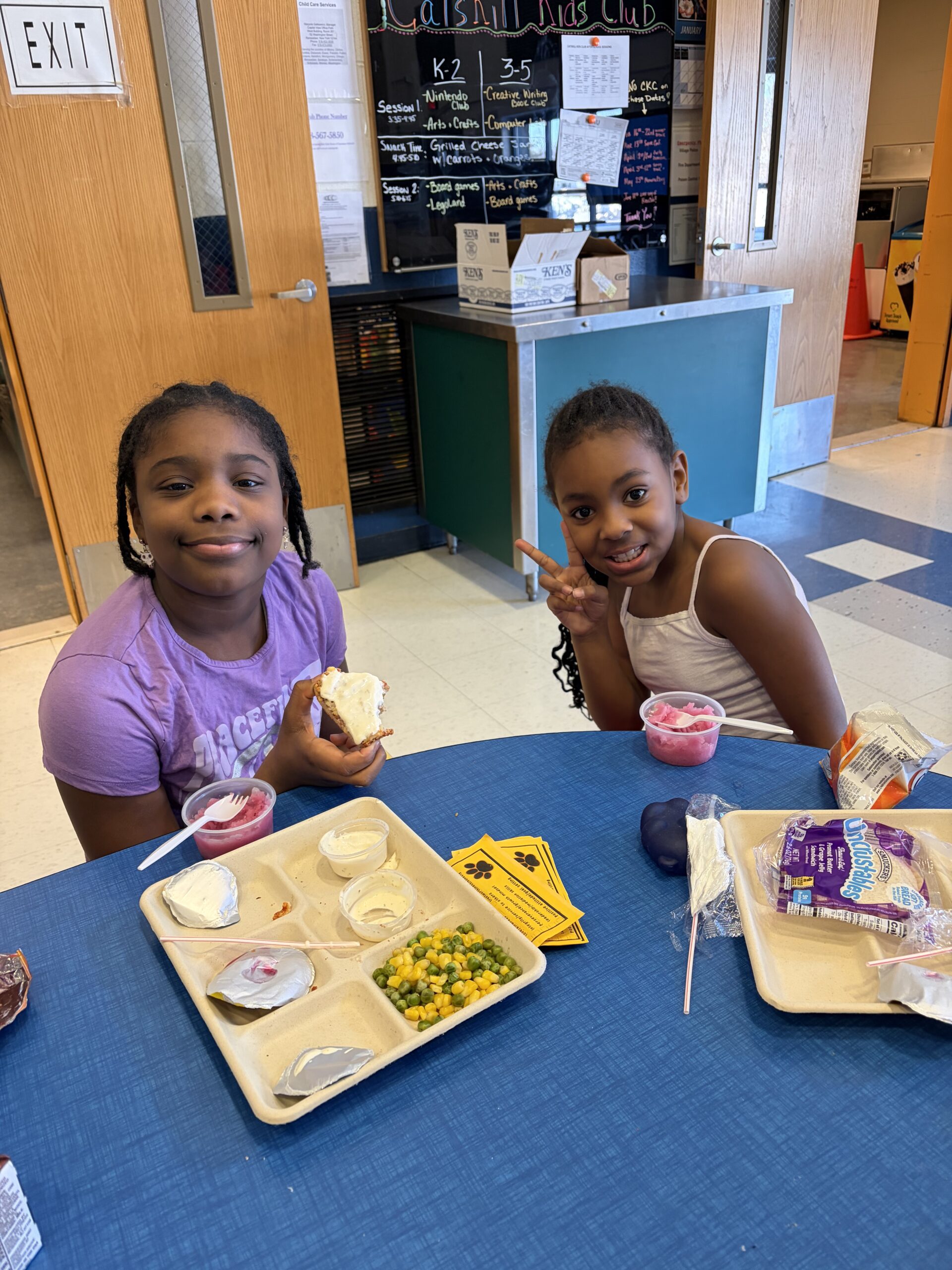 two girls eating lunch